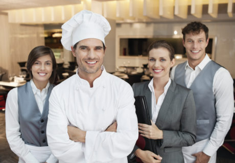 Portrait of smiling restaurant employees
